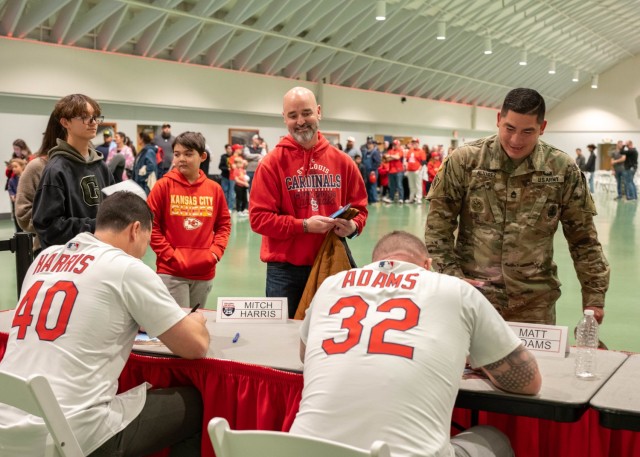 Fort Leonard Wood community members line up inside Nutter Field House to meet with St. Louis Cardinals baseball players and alumni Jan. 17 during the Cardinals Caravan’s visit to the installation.