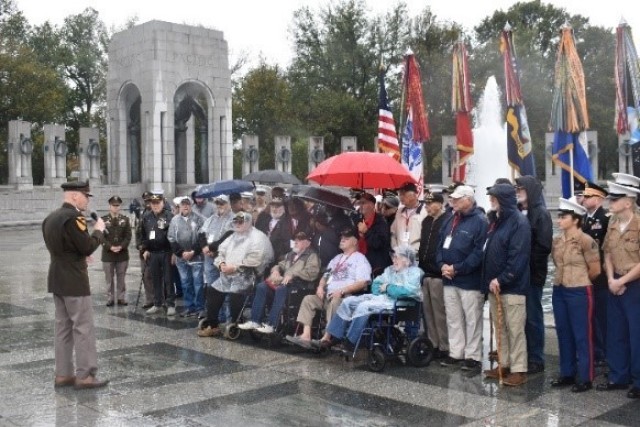 Lt. Gen. John Morrison Jr. speaks to a group of Vietnam War and Korean War veterans at the World War II Memorial in Washington D.C.