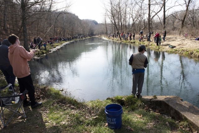 One hundred and fifty-two Fort Leonard Wood youth line the shore of Stone Mill Spring trying to catch a rainbow trout during the 2023 Kids’ Trout Fishing Derby. The derby is organized each year by the Directorate of Public Works’ Natural...