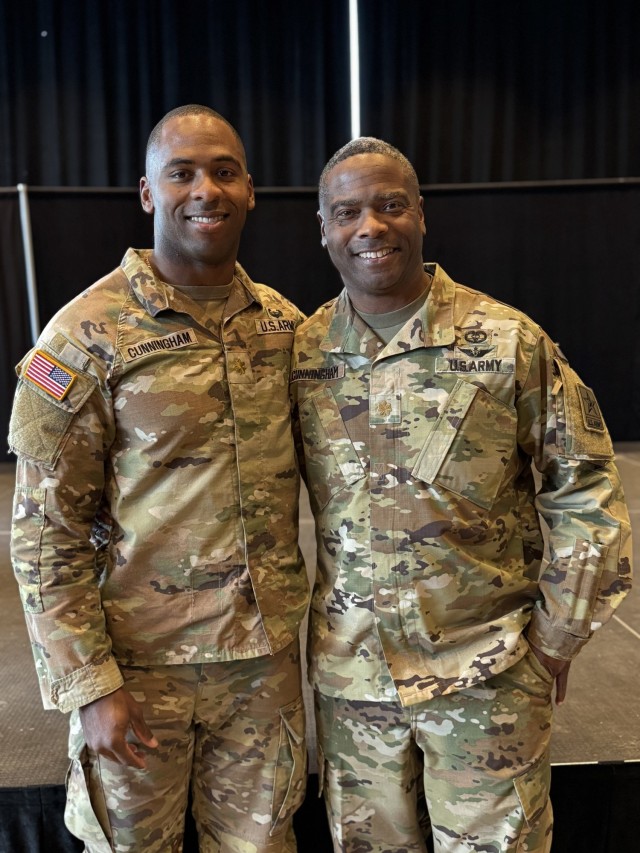 Maj. Guster Cunningham IV and Maj. Guster Cunningham III are all smiles after the elder Cunningham performed the promotion oath for his son in December 2024 at a West Point, New York, ceremony.