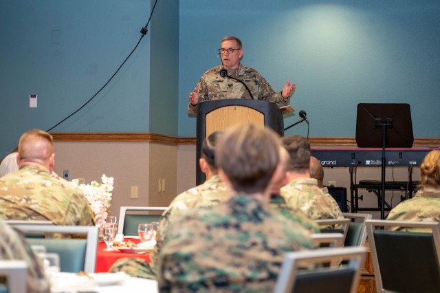 Chaplain (Col.) Bradley Godding, Maneuver Support Center of Excellence command chaplain, introduces the guest speaker of Fort Leonard Wood’s National Prayer Luncheon event Feb. 4 in Pershing Community Center. Brig. Gen. Bradley Leonard, MSCoE...