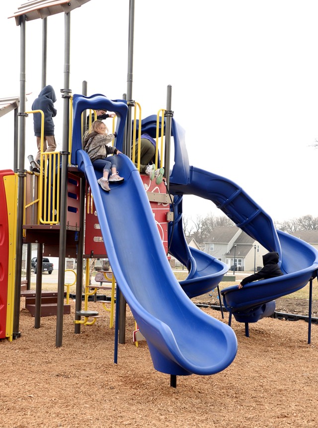 Children play a game of Tag using the slides and climbing structures of the destination playground Feb. 3, 2025, at the Fort Leavenworth Frontier Heritage Communities Community Center on Fort Leavenworth, Kansas. The newly constructed playground,...