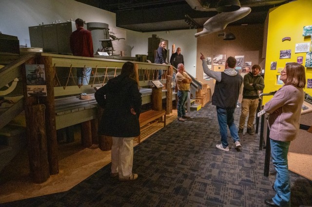 As part of the Museums of Missouri Initiative, Scott Franklin, the U.S. Army Chemical Corps Museum curator, leads teachers on a tour of the John B. Mahaffey Museum Complex Jan. 24.
