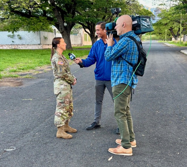 Col. Rachel Sullivan, U.S. Army Garrison Hawaii commanding officer, left, is interviewed by Chris Latronic, KHON TV broadcast reporter, during Full-Scale Exercise Fortress Shield ‘25 Feb. 5. During the exercise, U.S. Army Garrison Hawaii, with joint partners from Joint Base Pearl Harbor-Hickam, City and County of Honolulu Department of Emergency Management, State of Hawaii Emergency Management Agency and Hawaii Department of Transportation, simulated a crisis situation on the west side of Oahu and the evacuation of motorists through Kolekole Pass. 