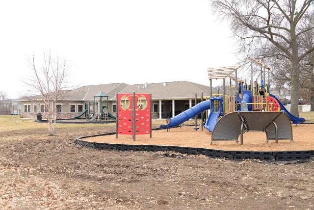Children play a game of Tag using the slides and climbing structures of the destination playground Feb. 3, 2025, at the Fort Leavenworth Frontier Heritage Communities Community Center on Fort Leavenworth, Kansas. The newly constructed playground,...