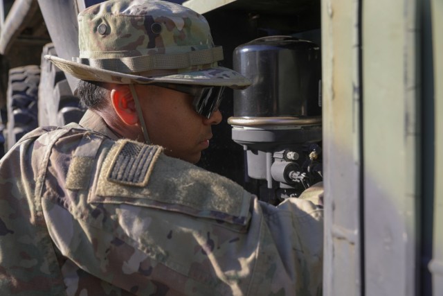 U.S. Army Pfc. Javier Torres, assigned to 215th Brigade Support Battalion, conducts field maintenance on a Palletized Load System (PLS) as part of support efforts to the multiple ongoing field exercises on Fort Cavazos, TX, Jan. 15th, 2025. The...