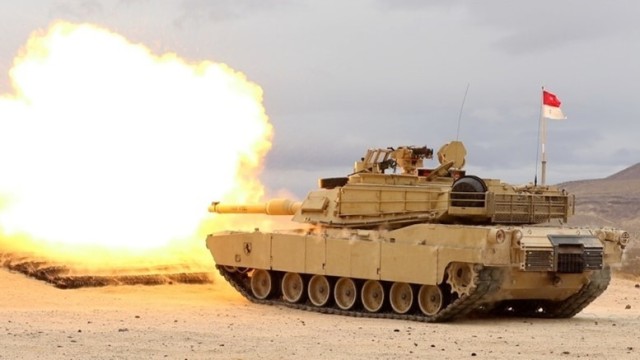An M1A2 Abrams SEP V2 main battle tank of teh 11th Armored Cavarly Regiment fires a M865 training round at the National Training Center and Fort Irwin Training area, Dec. 9, 2021