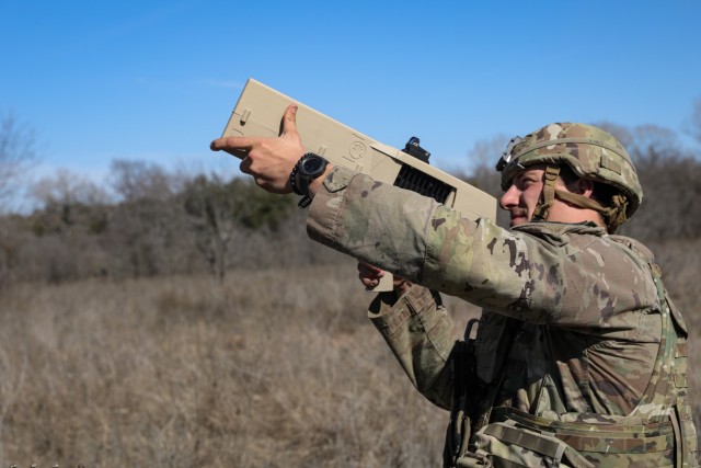 U.S. Army 2nd Lt. Kyle Scott, assigned to 2nd Battalion, 7th Cavalry Regiment, 3rd Brigade Combat Team, utilizes a Dronebuster during a simulated drone attack as part of a field exercise on Fort Cavazos, TX, Jan. 15th, 2025. The simulation of...