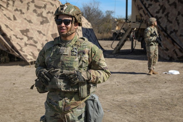 U.S. Army Pfc. Malik Fleming, assigned to 3d Brigade Engineer Battalion, conducts an interview about their role during simulated drone attacks; as Pfc. Joseph Duenasas watches the sky, part of a field exercise on Fort Cavazos, TX, Jan. 15th, 2025....