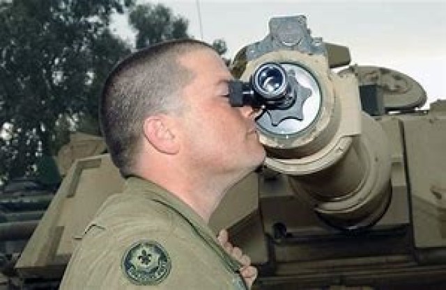 Using the in-bore muzzle boresight device.
