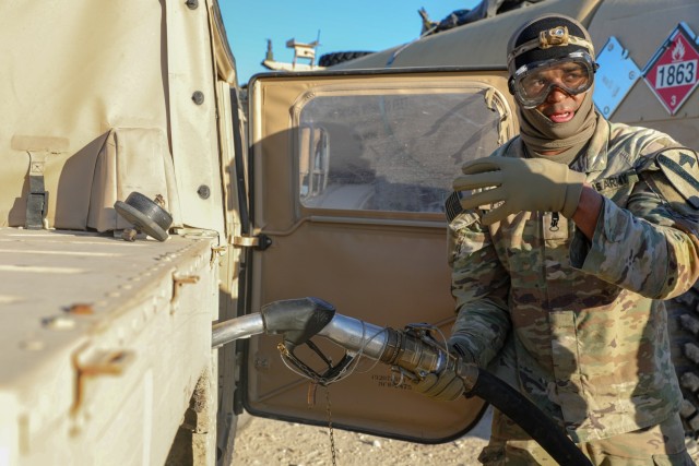 Pfc. Tyshawn Prude, assigned to 215th Brigade Support Battalion, instructs on the standard of how to fuel a High Mobility Multipurpose Wheeled Vehicle during field exercises, on Fort Cavazos, TX, Jan. 15th, 2025. Pfc. Prude, a Petroleum Supply...