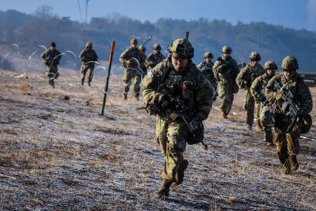 U.S. Army Soldiers assigned to the 2nd Battalion, 3rd Infantry Regiment, Korean Rotational Force, 2nd Infantry Division/Republic of Korea-United States Combined Division (2nd Inf. Div./ROK-U.S.), along with ROK Army Soldiers, move towards their next objective during a live-fire exercise (LFX) at the Rodriguez Live Fire Complex in Pocheon, Republic of Korea, on Jan. 23, 2025. Completing an LFX prepares Soldiers to defend against enemy threats in dynamic environments as well as improving upon their marksmanship skills. 