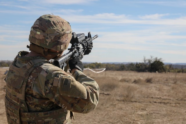U.S. Army Pfc. Joseph Duenas, assigned to 3d Brigade Engineer Battalion, reacts to a simulated drone attack as part of a field exercise on Fort Cavazos, TX, Jan. 15th, 2025. The simulation of reacting to drone attacks during field exercises is...