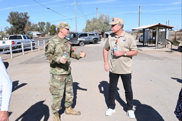 U.S. Army Yuma Test Center Commander Lt. Col. Kevin Hicks (left) speaks with La Paz County, Ariz. Supervisor Duce Minor prior to the 29th annual Camp Bouse Days ceremony on February 8, 2025.