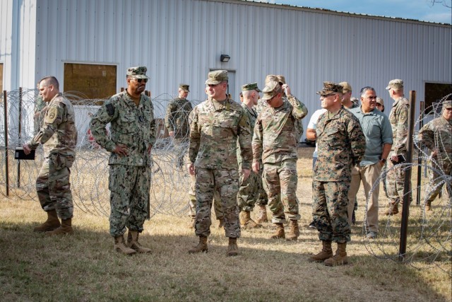 Admiral Alvin Holsey visits illegal aliens holding operations center at Naval Station Guantanamo Bay