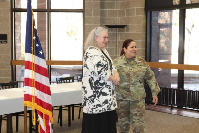 Fort McCoy Garrison Commander Col. Sheyla Baez-Ramirez completes a presentation Jan. 31, 2025, during a retirement ceremony for Fort McCoy Logistics Readiness Center employee Pamela Severson at Fort McCoy, Wis. Severson retired after serving the...