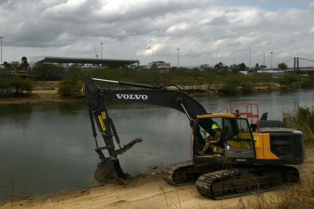 A U.S. Soldier with the Texas Army National Guard and assigned to the Texas Tactical Border Force, clears brush and shores up the edge of a path along the U.S. side of the Rio Grande River near Roma, Texas, to aid U.S. Border Patrol&#39;s ability to move throughout the area and monitor for possible illegal border crossings, Feb. 5, 2025. The TTBF, comprised of Texas National Guard members in a state active-duty status, works with state and federal law enforcement officials, including U.S. Border Patrol, with a continuing mission to deter, detect, and stop illegal border crossings and to interdict transnational criminals. 