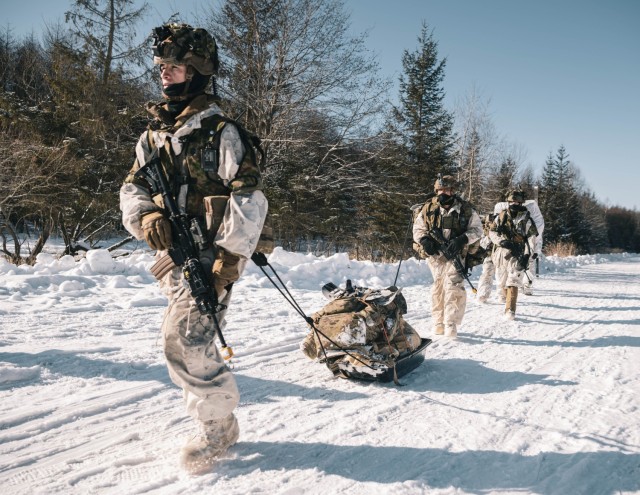 U.S. Army Pfc. Joaquin Mata (front), Spc. Joshua Miliman (center), and  Sgt. Wesley Wild all motormen with Alpha Company, 1st Battalion, 5th Infantry Regiment, conduct a patrol during North Wind 25 in Minami-eniwa, Japan, February 8, 2025. North...