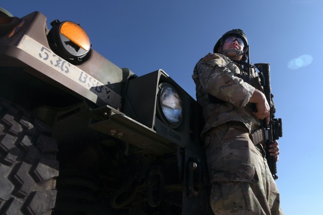 Spc. Marcus Galicia, an infantryman with B Company, 2nd Battalion, 142nd Infantry Regiment, Texas Army National Guard, monitors an area along the southern border near Brownsville, Texas, as part of an operation with the Texas Tactical Border Force Feb. 3, 2025.