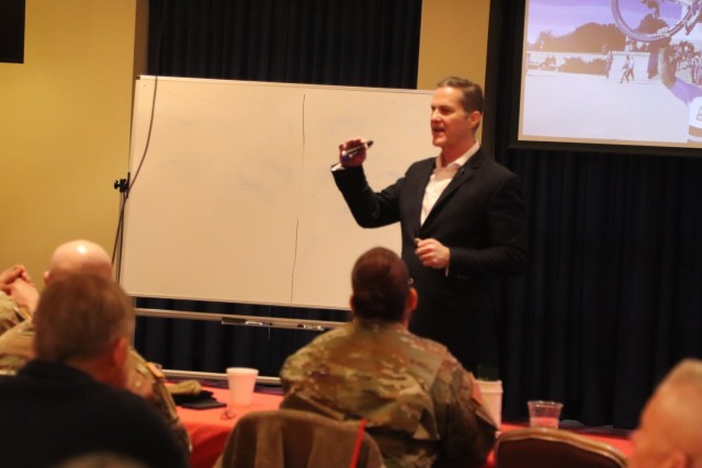 Retired Army Col. Chris Kolenda gives a presentation during a “lunch and learn” event at Fort McCoy, Wis., on Jan. 21, 2025, at McCoy’s Community Center that focused on leadership. The event focused on the topic of leadership at the...