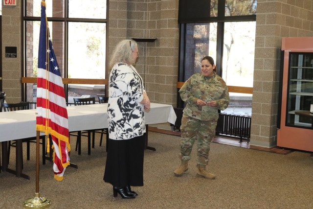 Fort McCoy Garrison Commander Col. Sheyla Baez-Ramirez completes a presentation Jan. 31, 2025, during a retirement ceremony for Fort McCoy Logistics Readiness Center employee Pamela Severson at Fort McCoy, Wis. Severson retired after serving the...