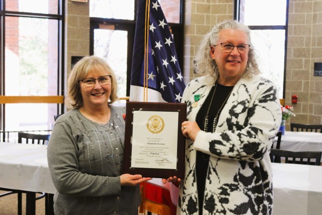 Fort McCoy Logistics Readiness Center (LRC) Director Tanya Morene completes a presentation Jan. 31, 2025, during a retirement ceremony for LRC employee Pamela Severson at Fort McCoy, Wis. Severson retired after serving the Fort McCoy community for...