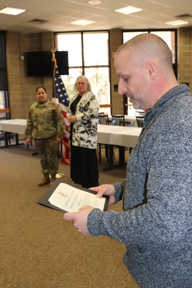 Fort McCoy Garrison Commander Col. Sheyla Baez-Ramirez completes a presentation Jan. 31, 2025, during a retirement ceremony for Fort McCoy Logistics Readiness Center employee Pamela Severson at Fort McCoy, Wis. Severson retired after serving the...