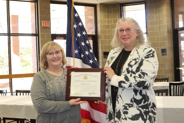 Fort McCoy Logistics Readiness Center (LRC) Director Tanya Morene completes a presentation Jan. 31, 2025, during a retirement ceremony for LRC employee Pamela Severson at Fort McCoy, Wis. Severson retired after serving the Fort McCoy community for...