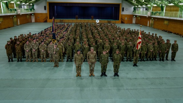 U.S. Army Soldiers and Japan Ground Self Defense Force members pose for a group photo at the closing ceremony of North Wind 25 in Camp Makomanai, Hokkaido, Japan, February 9, 2025. North Wind 25 is a bilateral cold-weather field training exercise...