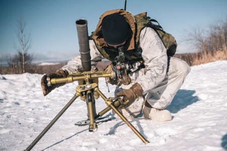 U.S. Army Spc. Joshua Milliman, a mortarman with Alpha Company, 1st Battalion, 5th Infantry Regiment, sets up a 60 mm mortar system during North Wind 25 in Minami-eniwa, Japan, February 8, 2025. North Wind 25 is a bilateral cold-weather field training exercise designed to enhance combat readiness and promote interoperability of the Japan Ground Self-Defense Force and the U.S. Army, taking place January 31 through February 9, 2025, at Camp Makomanai and the Hokudai-en Hokkaido Large Training Area in Hokkaido, in northern Japan. This exercise reaffirms the U.S. commitment to the defense of Japan against external aggression. 