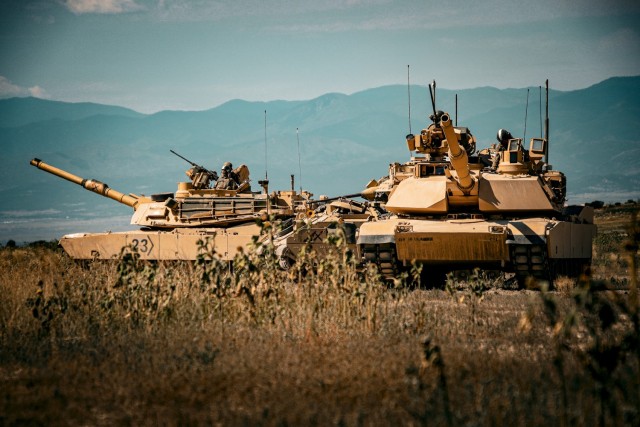 Elements from 2nd Platoon, Company C, 1-8 Infantry and fire support assets prepare to displace to their next staging area.