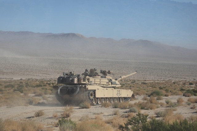 M1A2 crew from 3rd PLT, Company C, 1-8 Infantry moves to a secondary CP location during force-on-force operations as part of NTC Decisive Action Rotation 24-02.