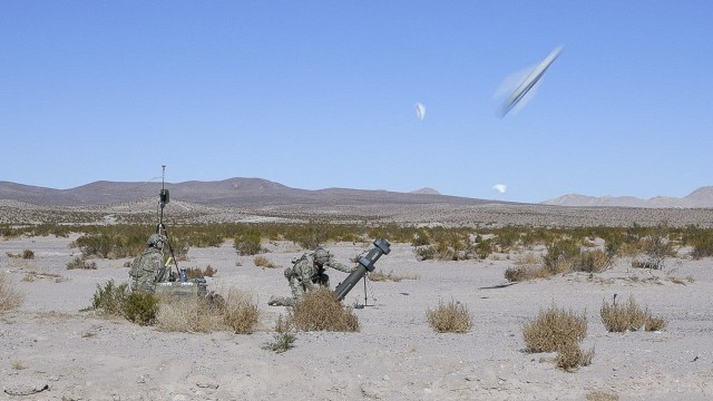 A U.S. Army Soldier assigned to the 1st Infantry Division launches a HERO-120 loitering munition system during Rotation 25-03 at the National Training Center, Fort Irwin, Calif., Jan 23rd, 2025. (U.S. Army photo by Pfc. Christopher Bailey,...