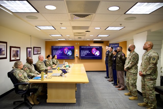Participants of the 2025 Career Counselor of the Year competition stand with their sponsors in front of a board of Senior Noncommissioned Officers after completing all the challenges Feb. 5, 2025. Four career counselors participated in the U.S....