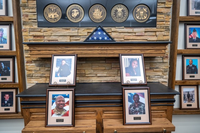 Soldiers, family members, and friends gather to honor fallen heroes at the Hall of Heroes Photo Mounting Ceremony, Feb. 07, 2025, at the Survivor Outreach Services Center on Fort Moore, Georgia. Photos mounted include those of Pfc. Keon Wiliams,...