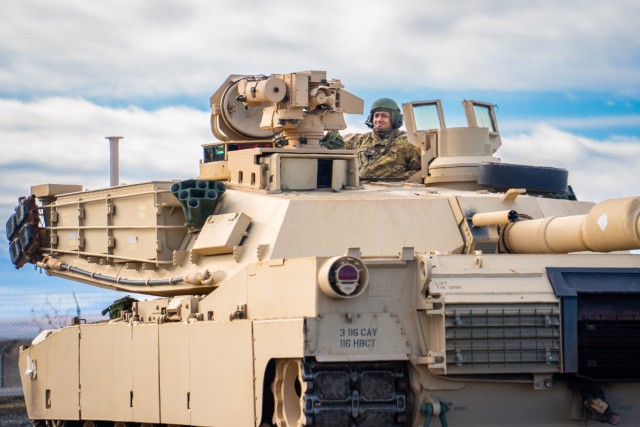 Spc. Chance Savage from Troutdale, Ore., of the 3rd Battalion, 116th Cavalry Regiment, prepares the loader&#39;s station of an M1A2 SEP v2 Abrams tank before conducting driver training on the newly established tank trail at Raymond F. Rees Training Center in Umatilla, Oregon, Feb. 1, 2025.