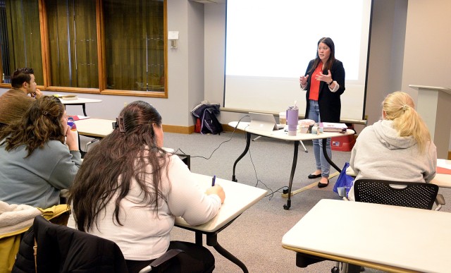 Megan Harless, permanent-change-of-station reform advocate and founder of PCS Like A Pro, offers tips and explains processes during the “Master Your PCS” class offered by Stronghold U Feb. 11, 2025, in the Armed Forces Insurance conference...