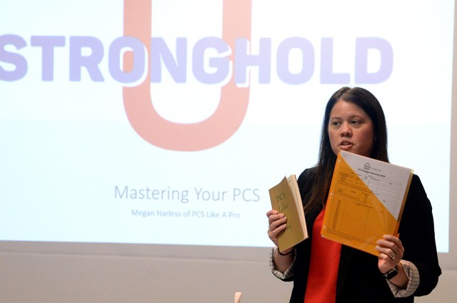 Megan Harless, PCS reform advocate and founder of PCS Like A Pro, shows “Master Your PCS” class participants the forms included in their packets during the Stronghold U educational offering Feb. 11, 2025, in the Armed Forces Insurance...