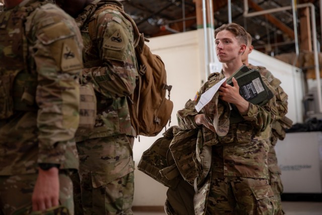 Soldiers assigned to 1st Armored Division draw gear from a Central Issue Facility during a deployment readiness exercise at Fort Bliss, Texas, July 22, 2024. The deployment readiness exercise is in support of Operation Pacific Fortitude, which...