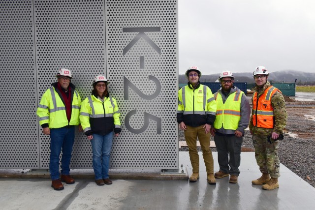U.S. Army Corps of Engineers Command Sgt. Maj. Douglas Galick (red safety vest) poses with USACE employees with the Nashville District during a tour Feb. 12, 2025, of ongoing construction of the K-25 Viewing Platform Building at East Tennessee...