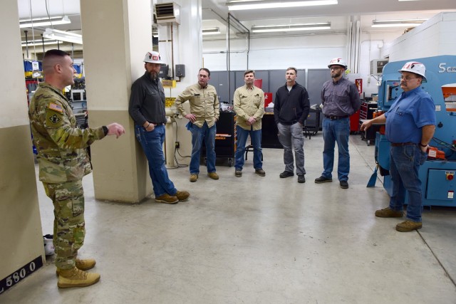 U.S. Army Corps of Engineers Command Sgt. Maj. Douglas Galick talks with employees Feb. 11, 2025, at the Wolf Creek Dam Powerhouse on the Cumberland River in Jamestown, Kentucky. Galick takes back information to USACE Headquarters about the...