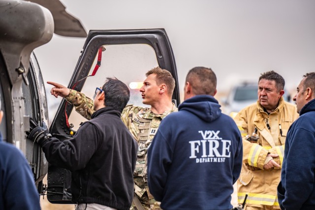 Soldiers assigned to Task Force Shikra train in conjunction with the ASG Kuwait Fire Department on UH-60 crew extraction on Camp Buehring, Kuwait, February 11, 2025. Aircraft familiarization and recovery operations ensure both crews and first...