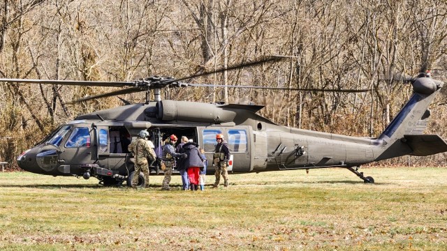 Airmen from the Kentucky Air National Guard’s 123rd Special Tactics Squadron evacuate 296 stranded residents from two housing complexes surrounded by floodwaters in Martin County, Kentucky, Feb. 17, 2025. The residents were flown to the Big...