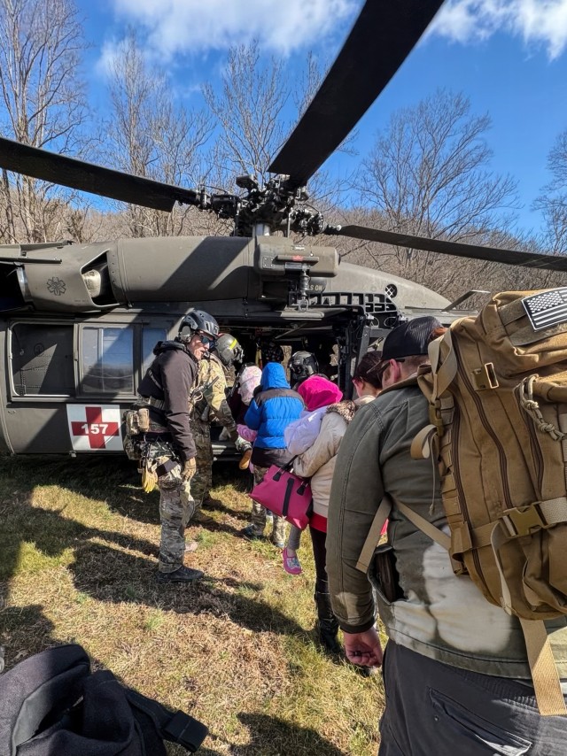 Airmen from the Kentucky Air National Guard’s 123rd Special Tactics Squadron evacuate 296 stranded residents from two housing complexes surrounded by floodwaters in Martin County, Kentucky, Feb. 17, 2025. The residents were flown to the Big Sandy Regional Airport in Debord aboard UH-60 Black Hawk helicopters from the Indiana Army National Guard and the Kentucky Army National Guard’s 63rd Theater Aviation Brigade. (U.S. Air National Guard photo by Master Sgt. Jon Shreve)