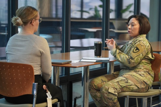 Col. Lisa Rennard, TACOM chief of staff (right), talks with her mentee during the TACOM Mentorship Program kickoff event on Jan. 29, 2025, at the Detroit Arsenal.