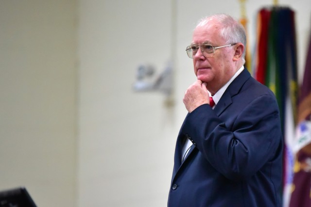 Clay Cole, deputy commander, Army Mission Installation Contracting Command makes remarks during a quarterly town hall Feb. 18, 2025, at Blesse Auditorium, Joint Base San Antonio – Fort Sam Houston, Texas. The MICC command group, Col. Freddy...