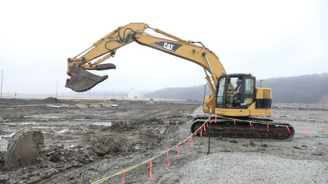 INDEPENDENCE, Mo. — Maj. Gen. John T. Reim, Picatinny Arsenal Commanding General and Joint Program Executive Officer Armaments and Ammunition (JPEO A&A) uses an excavator to break ground on a new 6.8 mm ammunition production facility at Lake...
