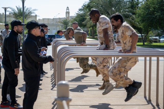 West Virginia and District of Columbia National Guard members and Qatar National Services Academy cadets compete in the Best Warrior Competition mystery event at the National Service Academy in Umm Salal Muhammed, Qatar, Feb. 4, 2025. The West Virginia Army National Guard hosted the annual competition in partnership with Qatar Armed Forces from Feb. 2-5, 2025, at the National Service Academy in Doha, Qatar. (U.S Air National Guard photo by Staff Sgt. Takara Williams)