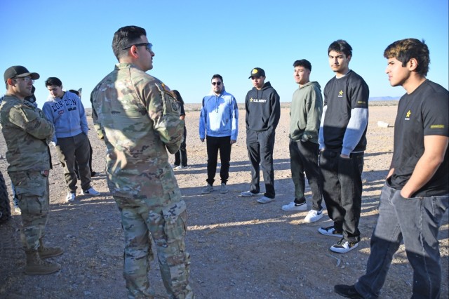 Staff Sgt. Bernardo Figueroa invited Anthony Cardone (front right), a Senior at Gila Ridge High School, who has already committed to the Army on the tour. Cardone hopes to serve as a parachutists. “I am here to see hopefully some of what I will...