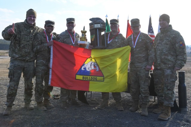 U.S. Soldiers receive the Order of Saint George Medallion after placing first in the U.S. Army Europe and Africa International Tank Challenge sponsored by the 7th Army Training Command in Grafenwoehr, Germany, Feb. 17, 2025.